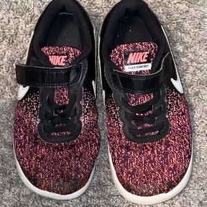 Pink and black toddler girls Nike tennis shoes